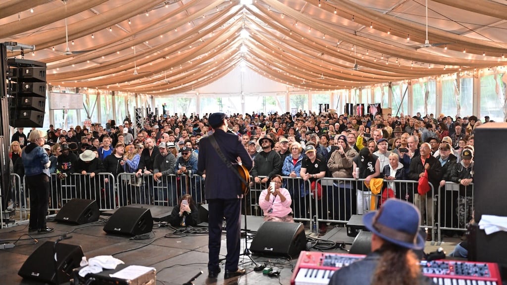 Blues musician playing electric guitar on stage at the Chicago Blues Festival
